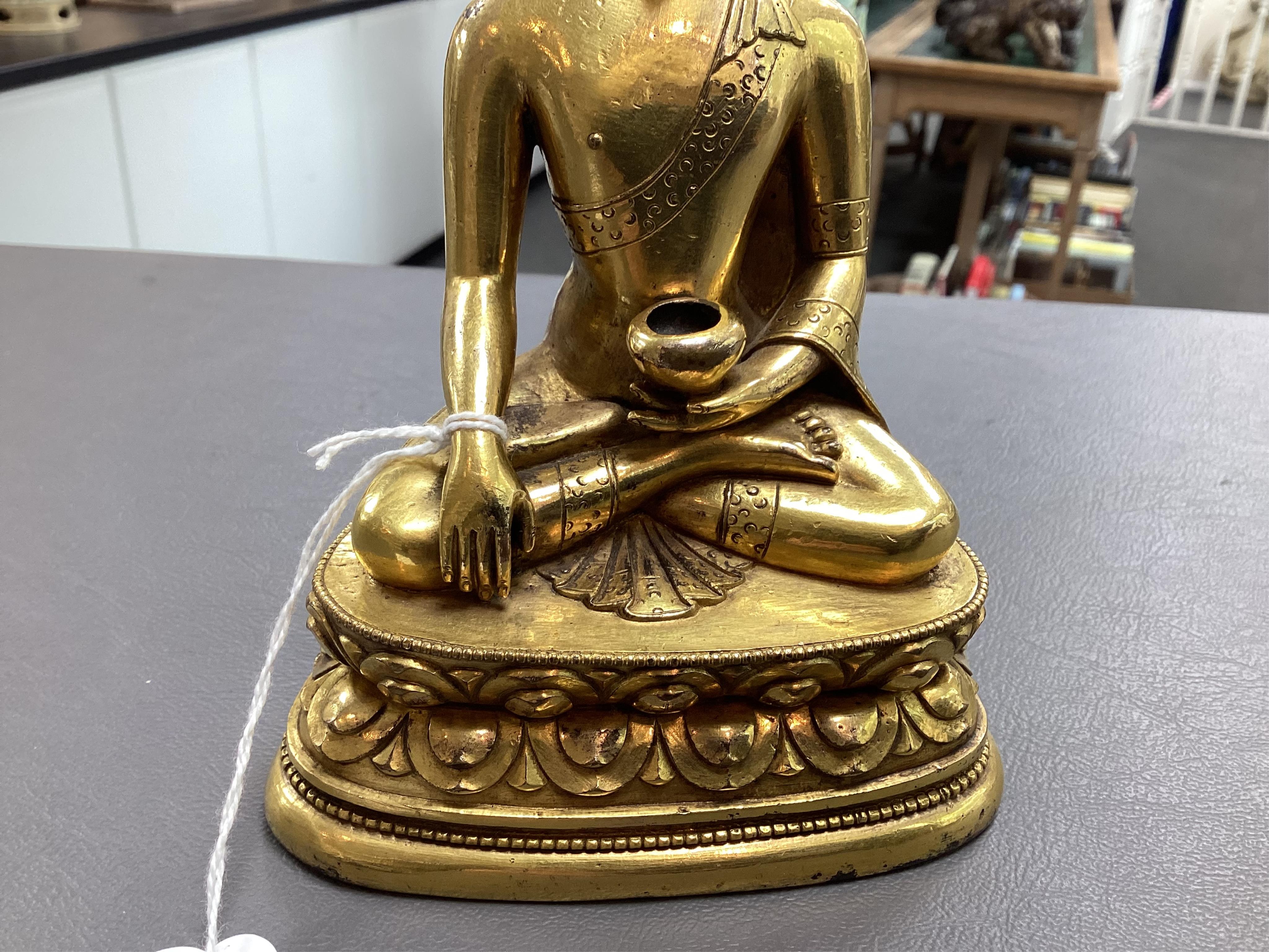A Mongolian gilt-bronze figure of Buddha Shakyamuni, possibly 18th century